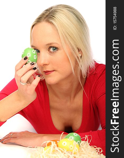 Beautiful blond woman laying on the floor with some easter eggs. Beautiful blond woman laying on the floor with some easter eggs