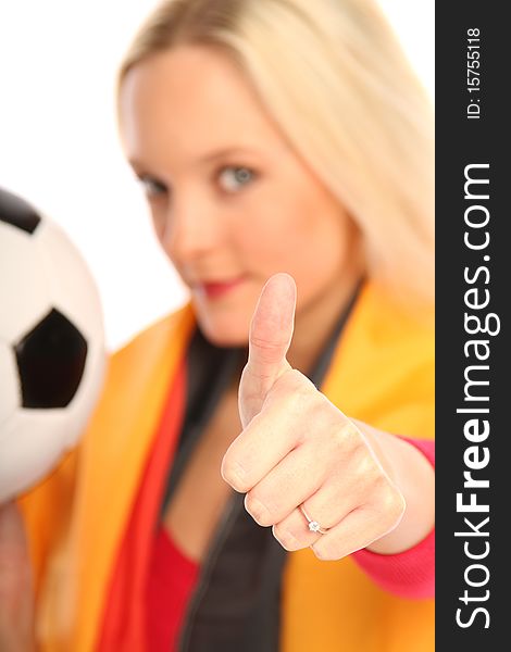 Blond woman with Thumbs high and a football