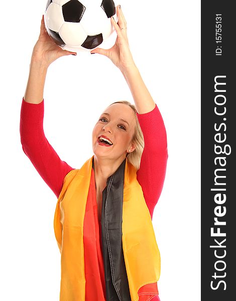 Blond female football fan with a german flag and a football