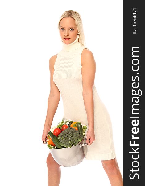 Young woman with fresh vegetables