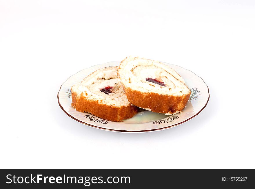 Cake on a plate on a white background
