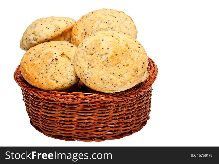 Lemon poppy seed muffins in basket isolated on white