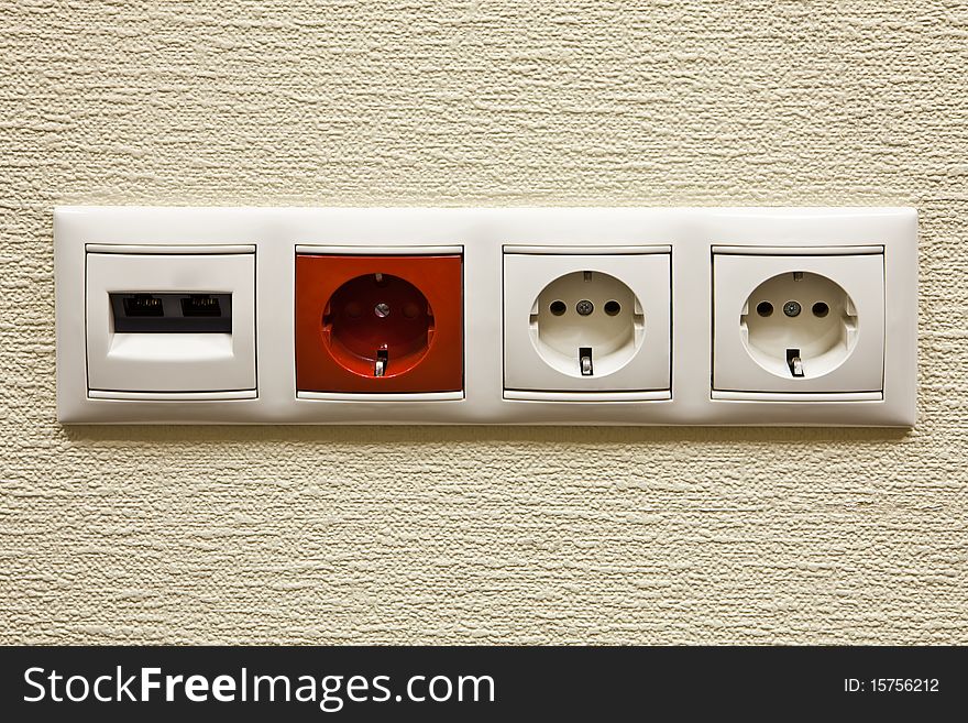 Electric and network sockets in a wall