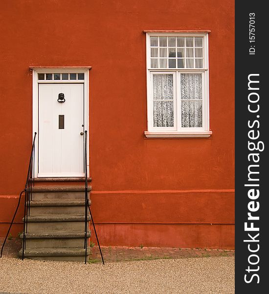 Graphical image of a facade with door and window with a Mediterranean touch. Graphical image of a facade with door and window with a Mediterranean touch