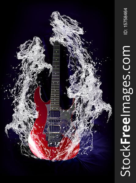 Red electric metal guitar surrounded by water splashs. Red electric metal guitar surrounded by water splashs