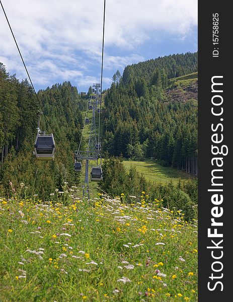 Cable car on cableway in the italian Alps.
