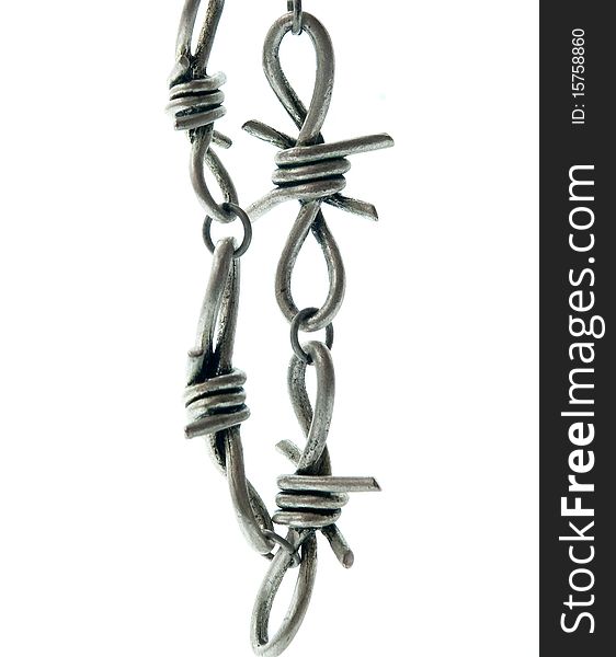 Detail of silver barbed wire on white background