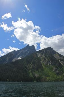 Clouds Hovering Over The Grand Tetons Stock Photo Clouds Hovering Over The Grand Tetons Stock Photo