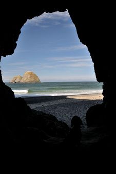 Sea Rocks From Cave With Dog Stock Images