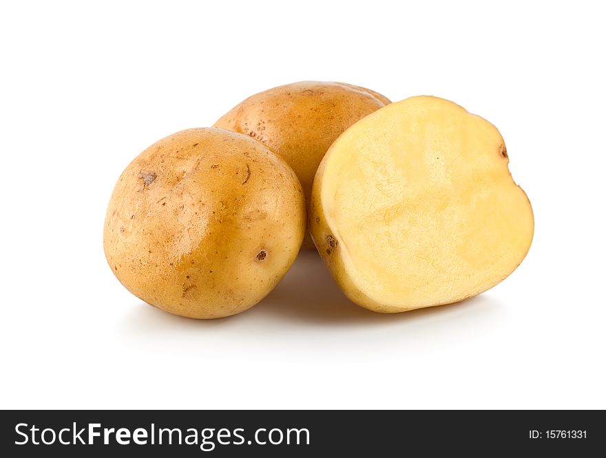 Three potatoes isolated on a white background. Three potatoes isolated on a white background