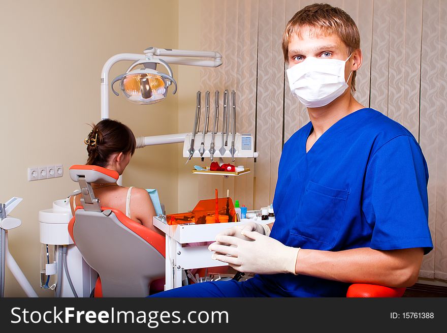 Young Dentist At Work
