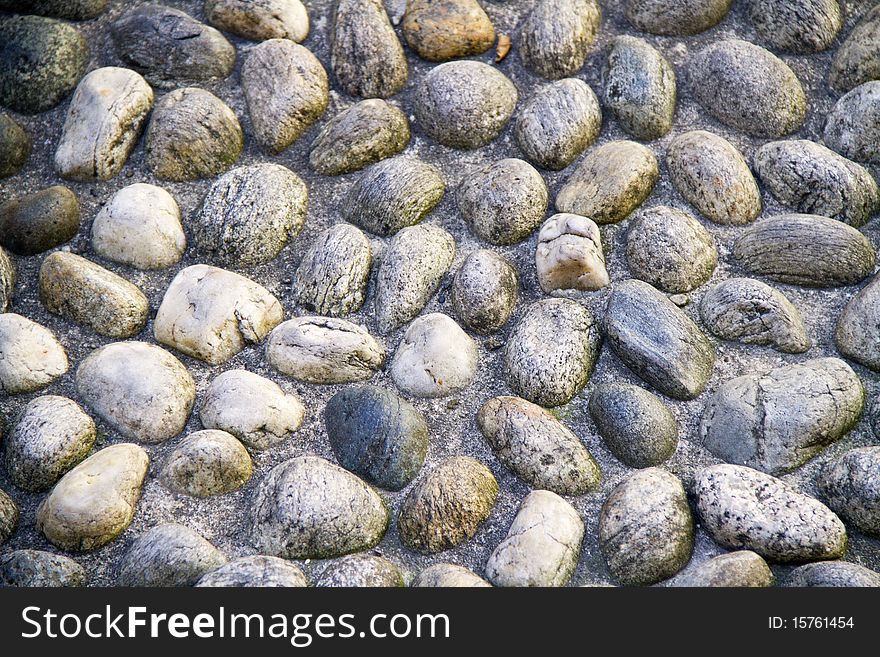 Background of small pebbles of a road. Background of small pebbles of a road