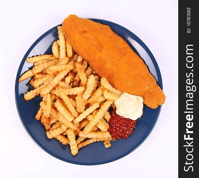 British cuisine: Fish and chips with ketchup and mayonnaise
