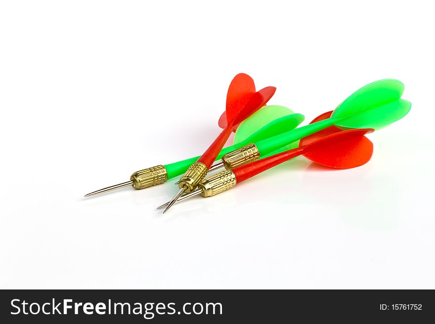 Red And Green Darts Isolated On White Background