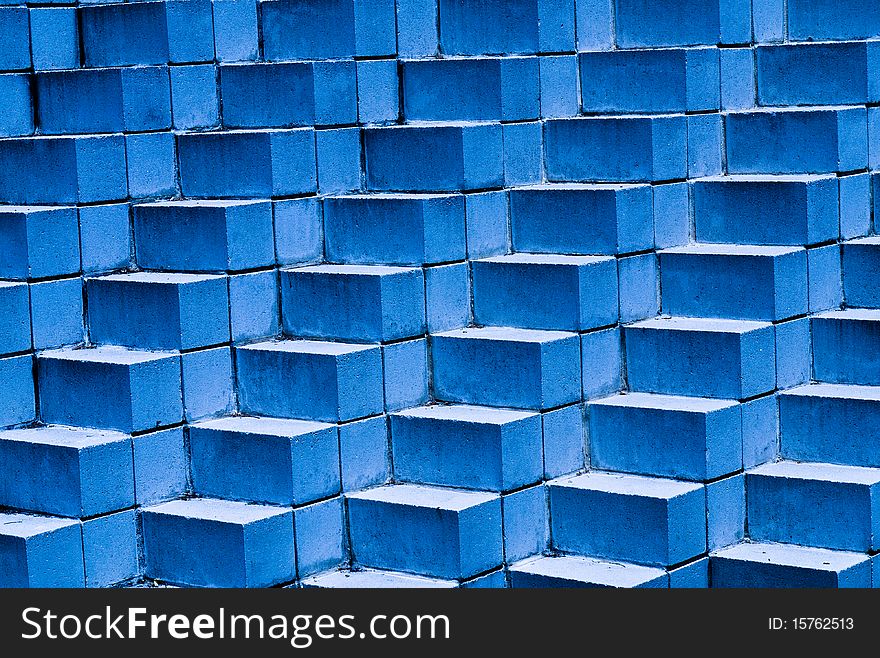 Blue brick background pattern with bricks