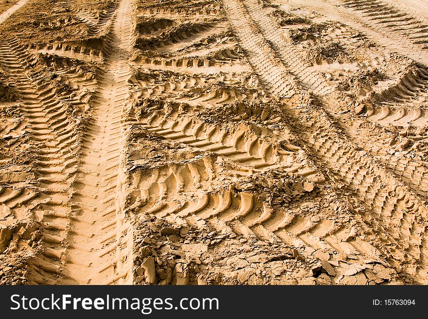 Traces on the sand, remained after the passed cars. Traces on the sand, remained after the passed cars