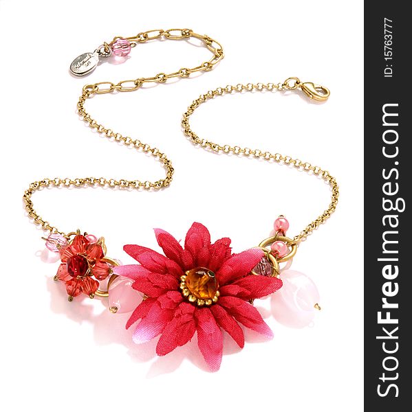 Neckless with flowers shot in front of white background. Neckless with flowers shot in front of white background