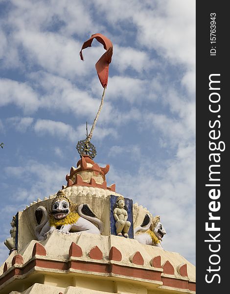 Top on an Hindu Temple with a red flag in Puri, Orissa, India. Top on an Hindu Temple with a red flag in Puri, Orissa, India.