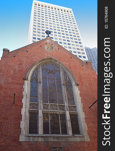 Old brick church with big vitraze window from San Francisco with new bouldings from downtown. Old brick church with big vitraze window from San Francisco with new bouldings from downtown.