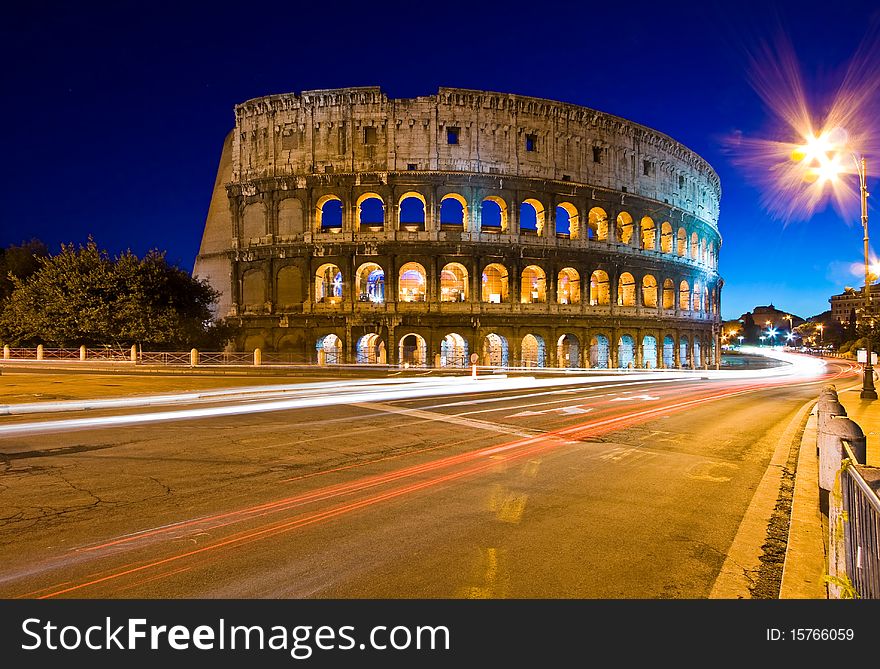 Colosseum in Twilight with Light trail of cars