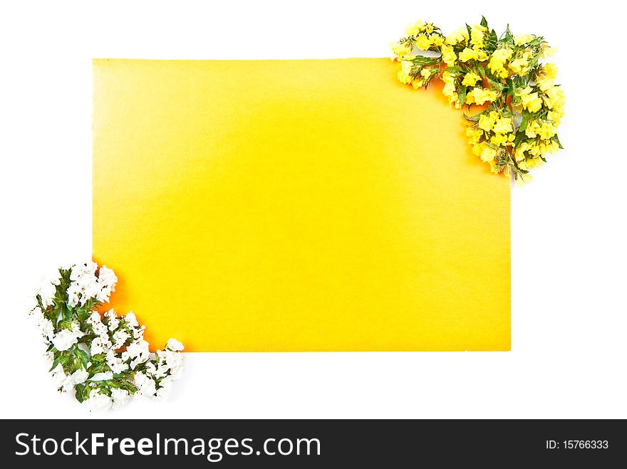 Yellow paper with flowers isolated on white. Yellow paper with flowers isolated on white