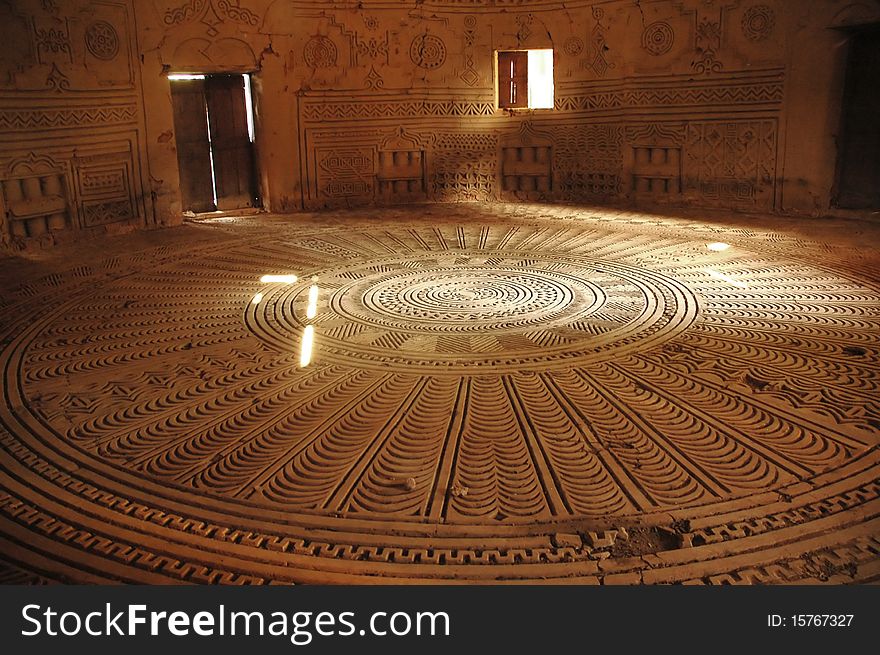 View inside an old Fula chiefs meeting house with carved floor and walls in Dalaba, Guinea. View inside an old Fula chiefs meeting house with carved floor and walls in Dalaba, Guinea