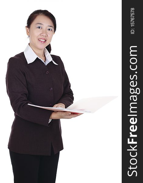 An Asian businesswoman holding a folder. An Asian businesswoman holding a folder