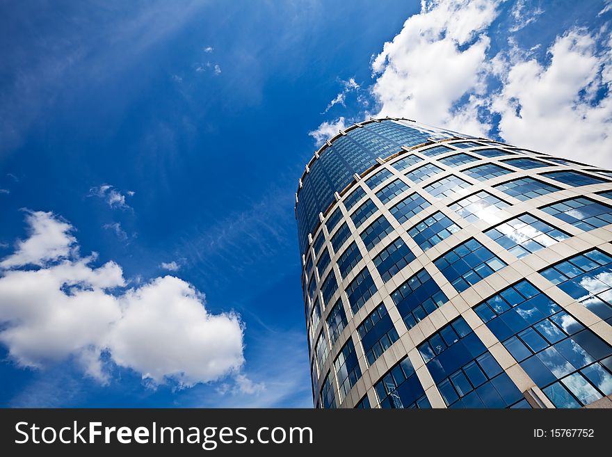 Skyscraper in business centre on a sky background. Skyscraper in business centre on a sky background