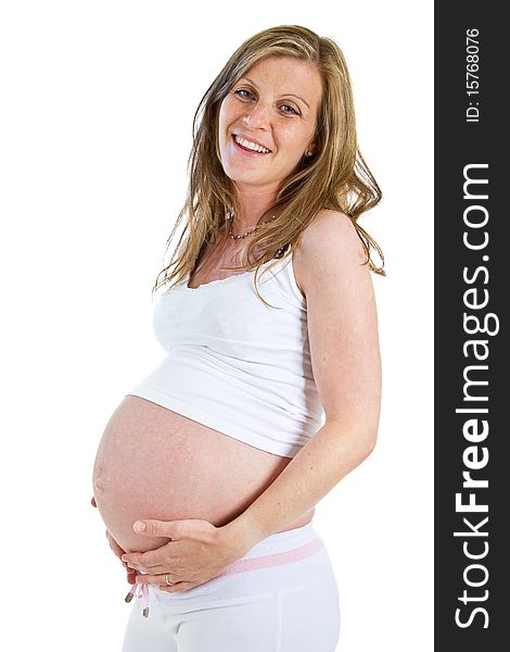 Young fresh pregnant woman isolated over white background. Young fresh pregnant woman isolated over white background.