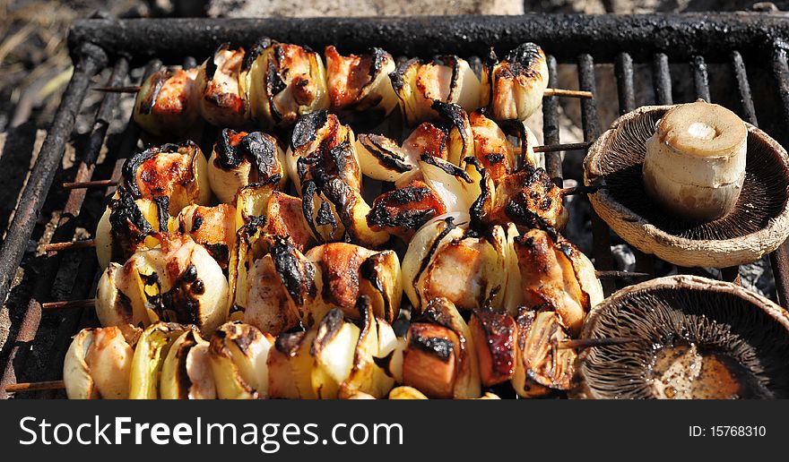 Barbecue and mushrooms on grill