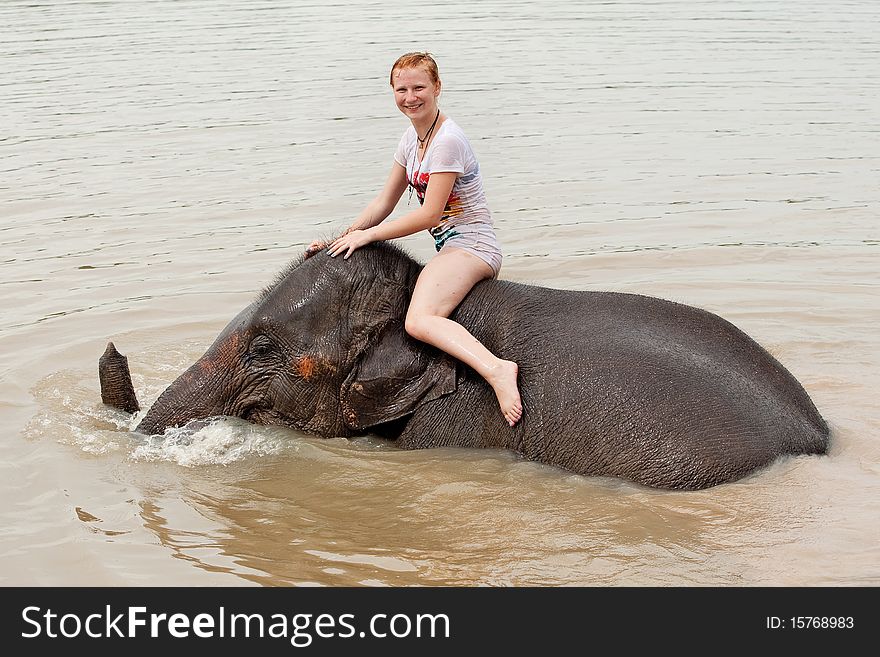 Ride an elephant, teenager have adventure at Surin in Thailand