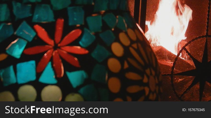 Wood Fire Burning, Snap, Stained Glass Candleholder, Metal Screen, Broadview, Seattle, Washington, USA