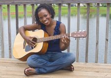 Black Woman With Guitar Royalty Free Stock Photography Black Woman With Guitar Royalty Free Stock Photography