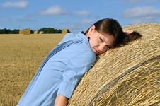 Young Woman Near The Straw Bales Royalty Free Stock Photos Young Woman Near The Straw Bales Royalty Free Stock Photos