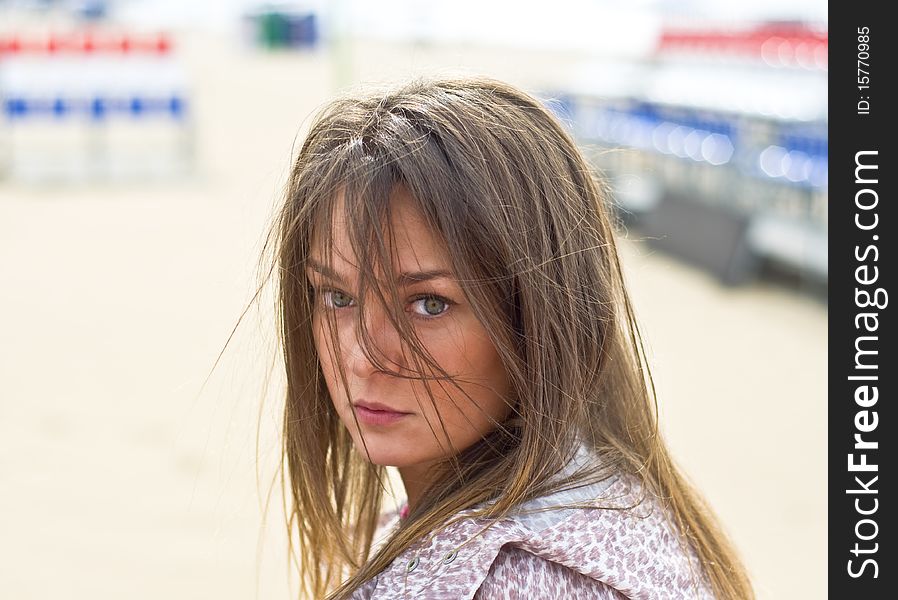 Cute attractive women at the beach. Summer portrait. Blurring background.