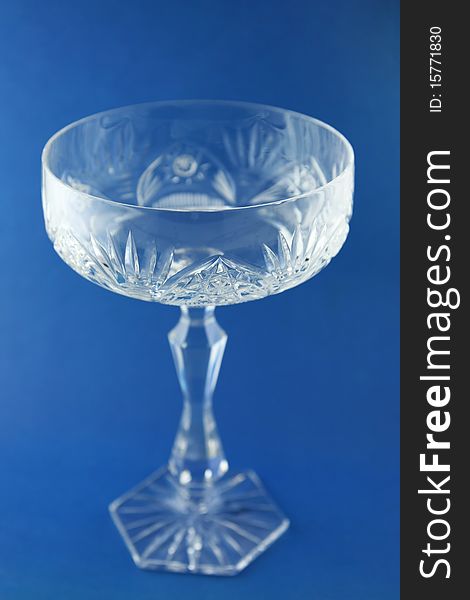 Elegant goblet on the blue background
