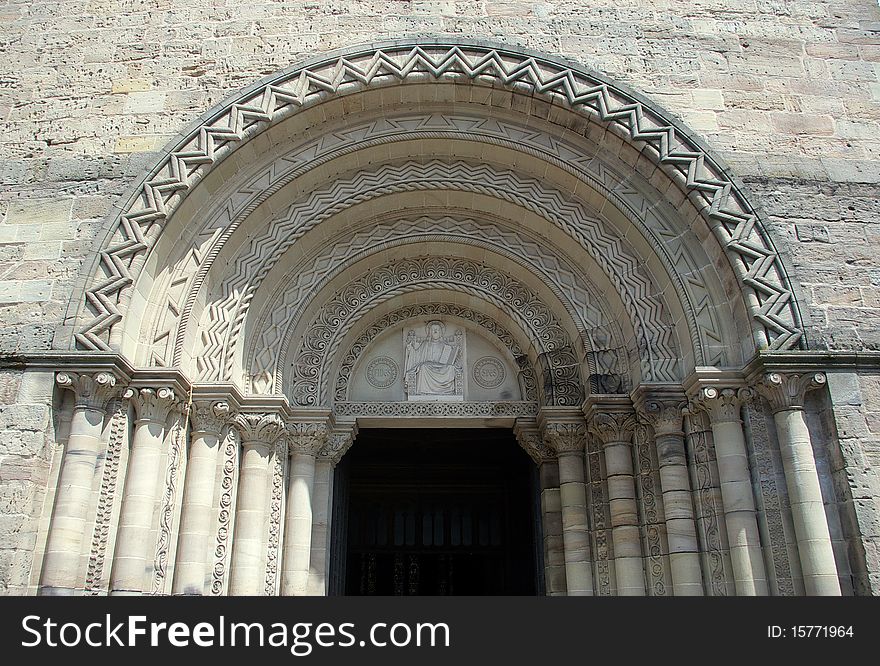 An arched church doorway with gothic carvings ,Nancy, France. An arched church doorway with gothic carvings ,Nancy, France.