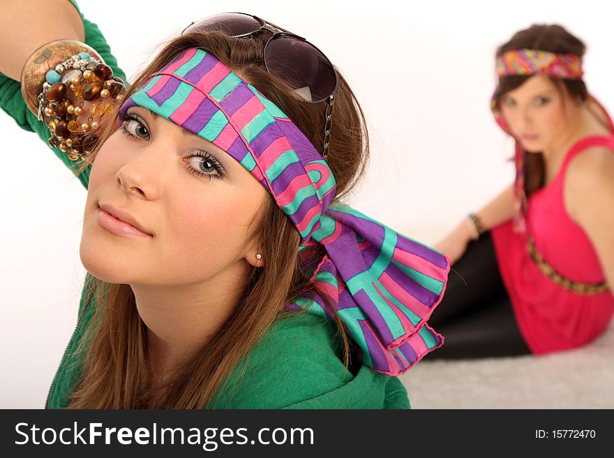 Two brunette girls in hippie-style