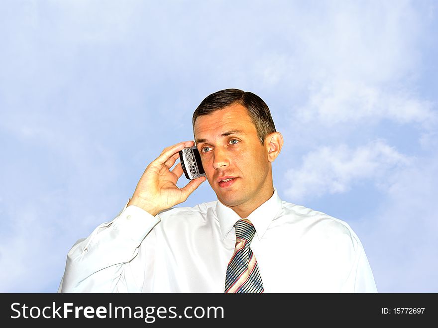 Portrait successful adult businessman speak mobile phone. Portrait successful adult businessman speak mobile phone