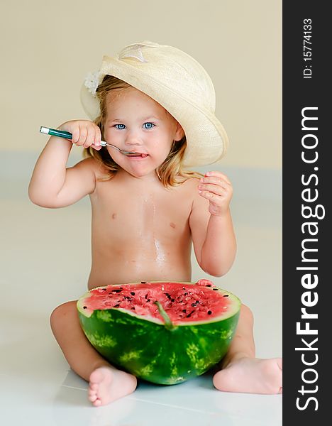 Funny girl eating with appetite ripe watermelon. Funny girl eating with appetite ripe watermelon
