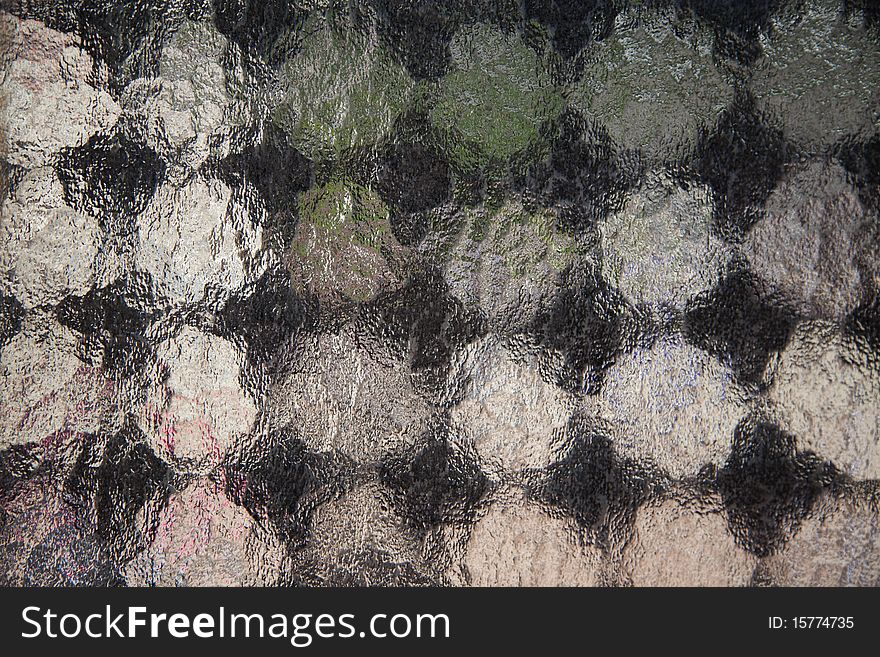 A background of frosted window with checkerboard pattern. A background of frosted window with checkerboard pattern