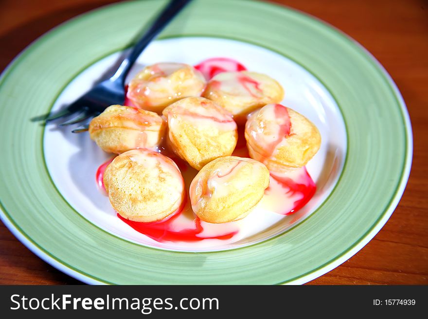 A traditional Dutch batter treat. Resembling small, fluffy pancakes, they are made with yeast and buckwheat flour. A traditional Dutch batter treat. Resembling small, fluffy pancakes, they are made with yeast and buckwheat flour