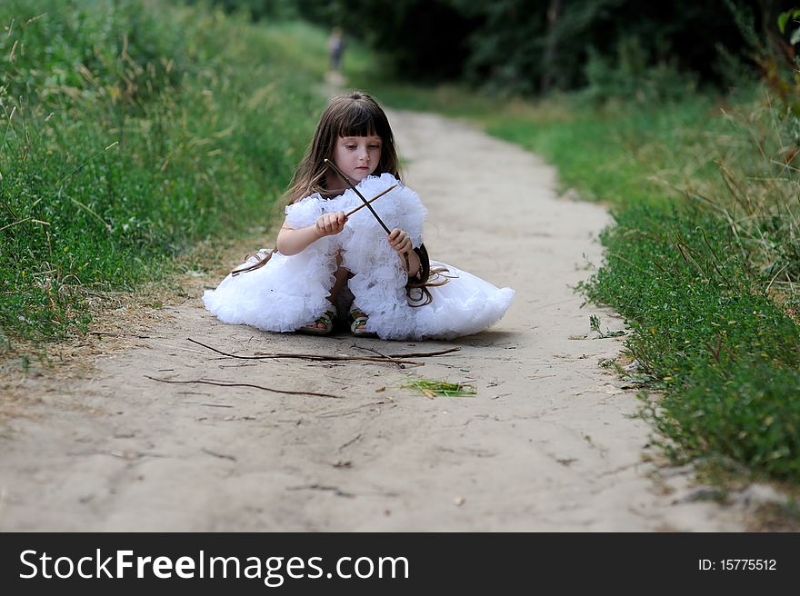 Adorable toddler girl with very long dark hair