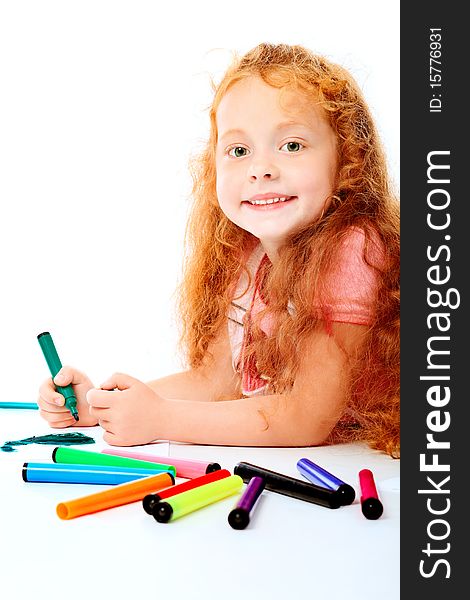 Portrait of a happy girl with felt pens. Isolated over white background. Portrait of a happy girl with felt pens. Isolated over white background.