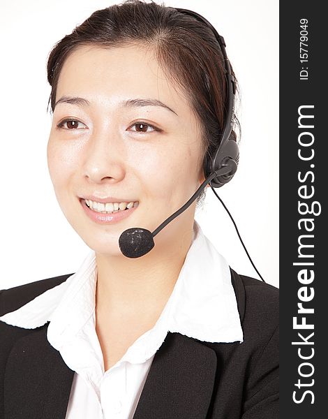 A Smiling Business Woman Talking On The Phone