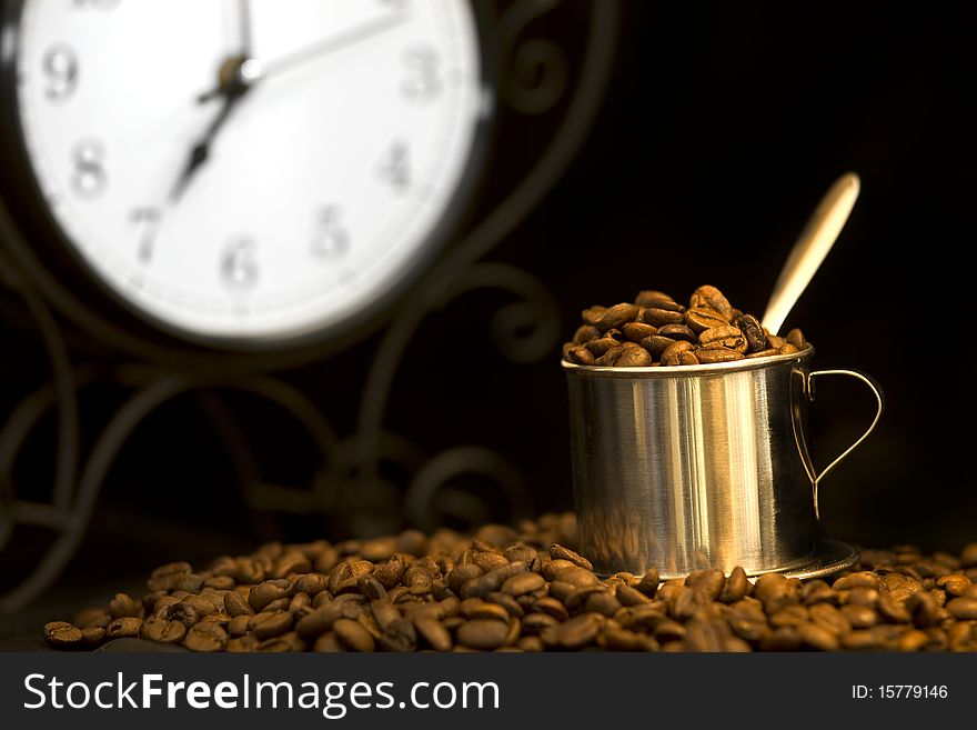 Steel Cup Of Coffee And Clock