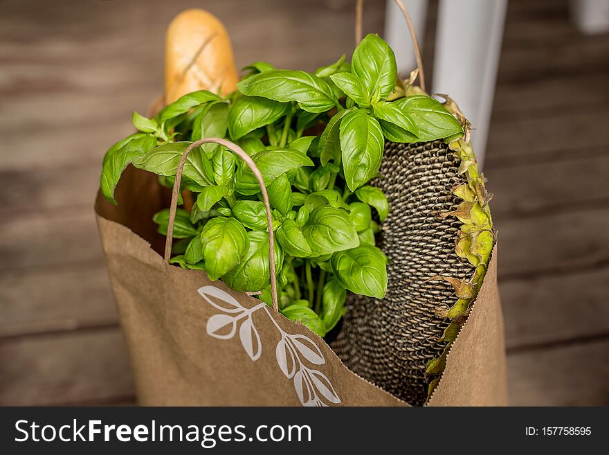 Various Healthy Food In Paper Bag On Wooden Background. Healthy Food From The Store