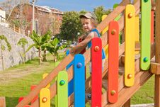 Child On The Playground Stock Photos