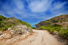 Coast Of Sardinia, Sea, Sand And Rocks Royalty Free Stock Image