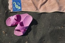 Beach Scene With Orangetowel And Pink Sandals Stock Photo Beach Scene With Orangetowel And Pink Sandals Stock Photo